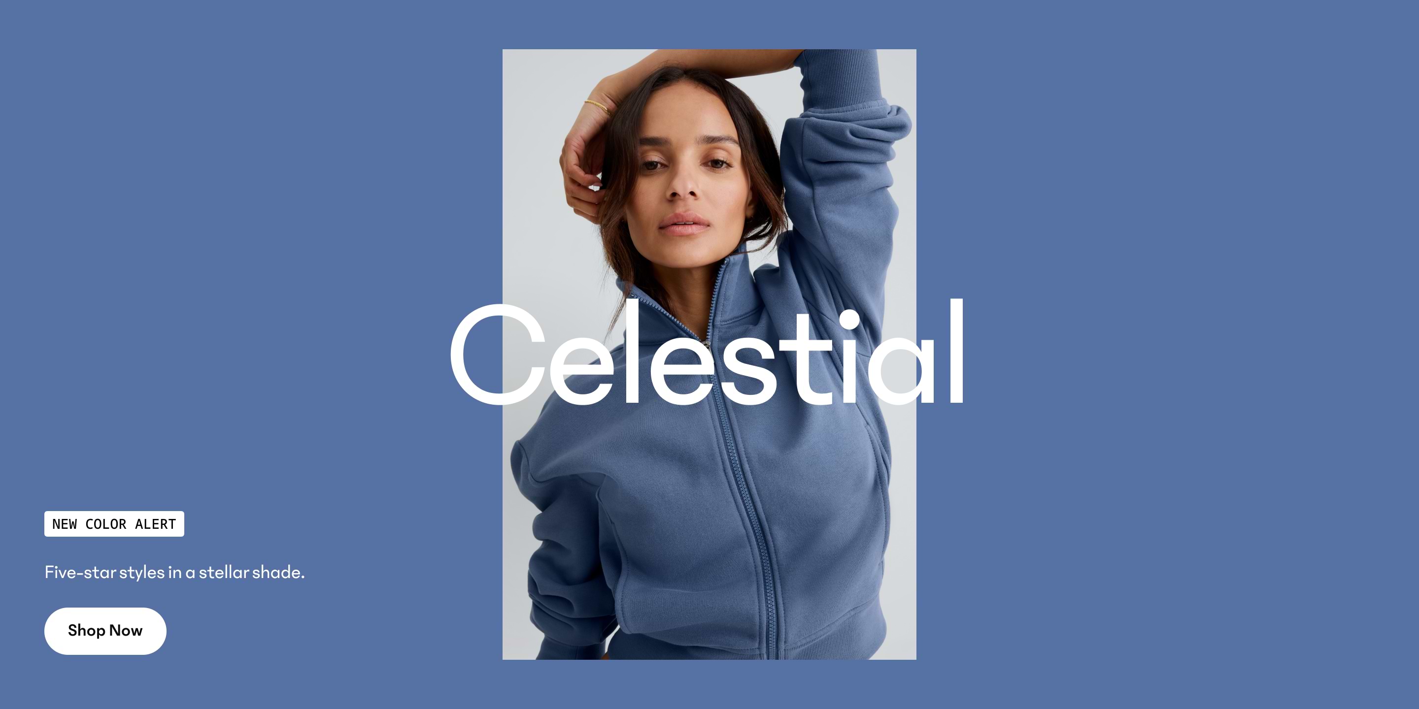 Woman wearing a blue zip-up hoodie on a blue background;  text “NEW COLOR ALERT. Celestial. Five-star styles in a stellar shade.” and a “Shop Now” button.