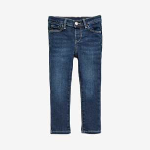 Front view of dark blue kids’ denim jeans with five pockets.