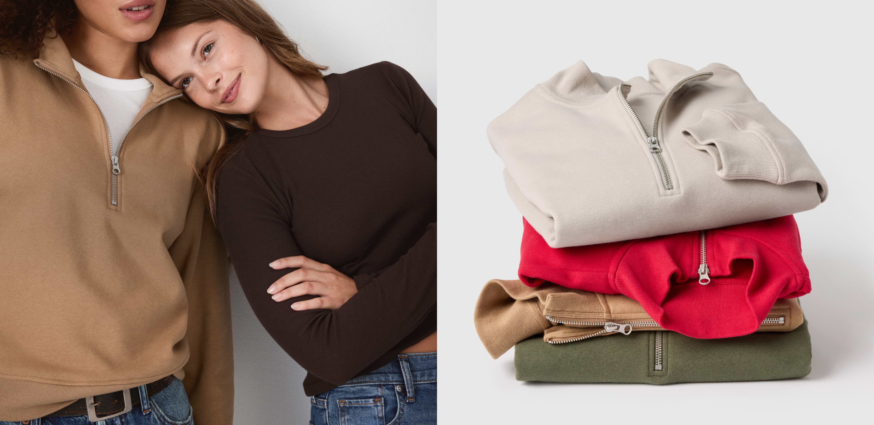 Two people in jeans wear a tan half‑zip and a brown long‑sleeve; beside them, folded half‑zip sweatshirts in beige, red, camel, and olive.