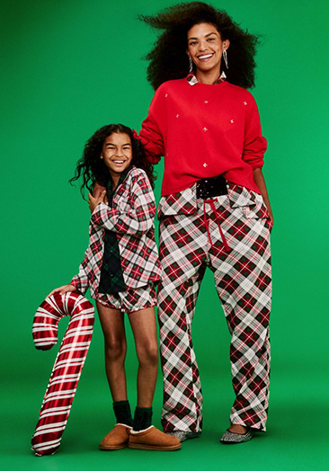 Image of a family wearing Old Navy matching pajamas.