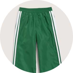 Green track pants with elastic waistband and white side stripes.