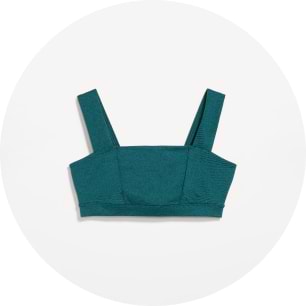 Teal square‑neck sports bra with wide straps.