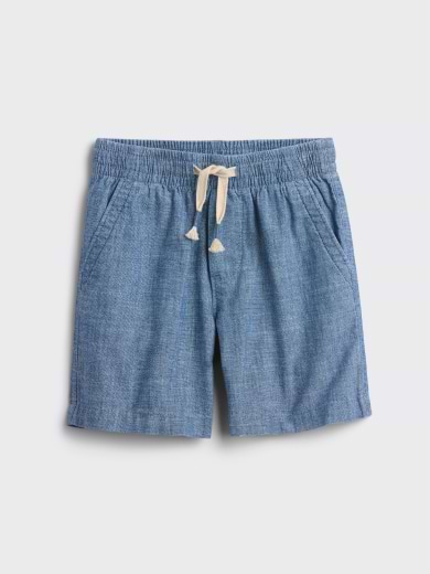 Light blue chambray shorts with elastic waistband, cream drawstring, and side pockets.