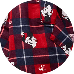 Red and navy plaid fabric featuring Mickey Mouse in a Santa hat with candy cane motifs.