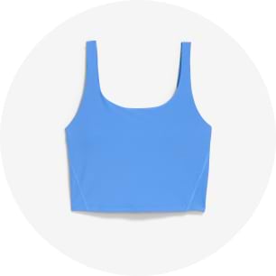 Light blue cropped tank top with scoop neckline and wide straps.