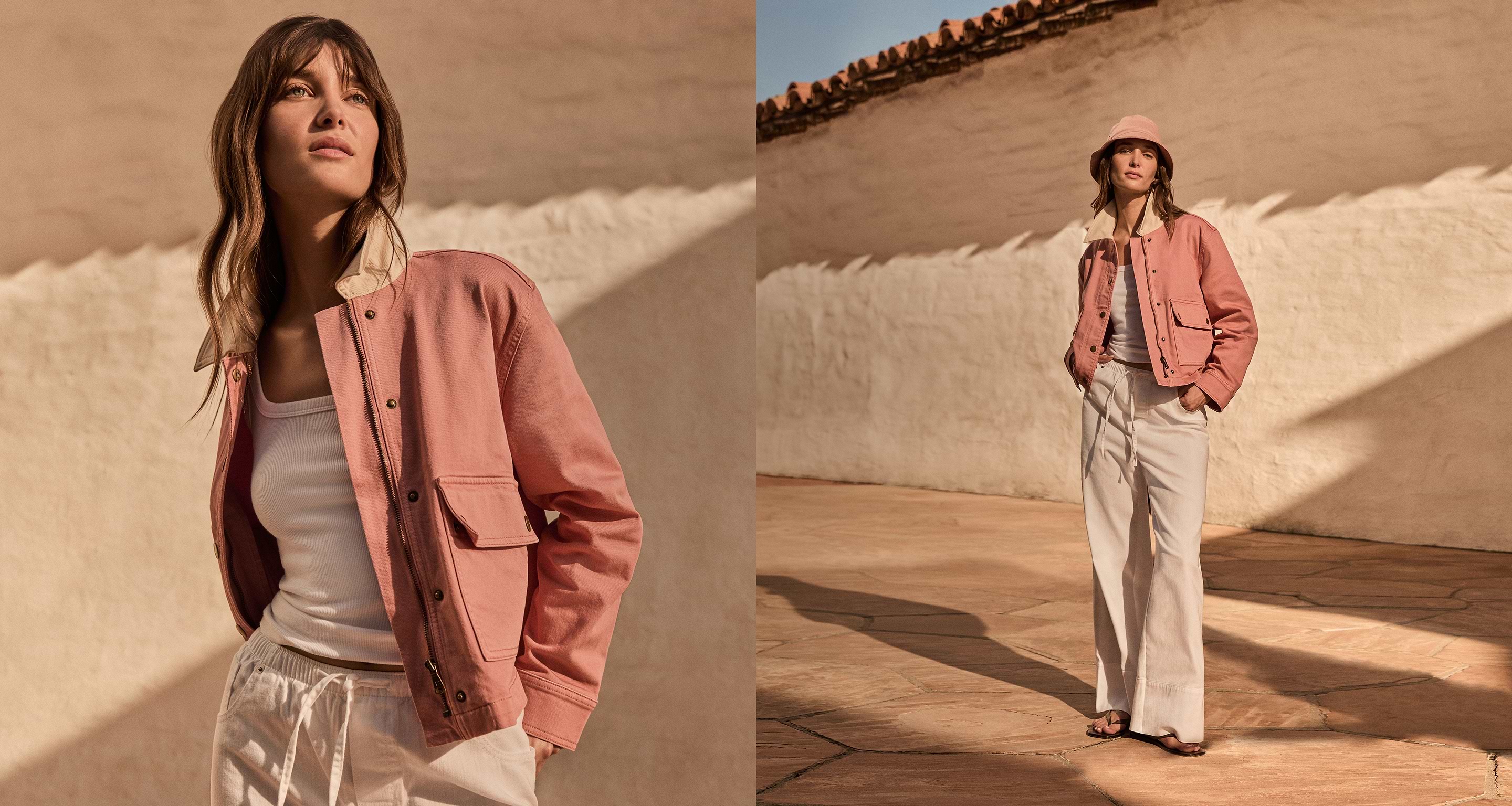 Woman in pink jacket, white top, and linen pants.
